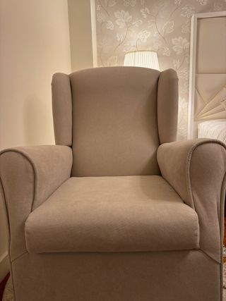 Poltrona a dondolo in tessuto beige