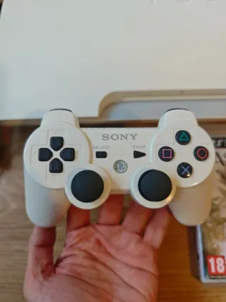 PS3 Slim Blanca + 4 Juegos