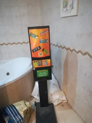 Máquina expendedora chicles y papel