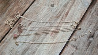 Lotto 4 collane con ciondoli