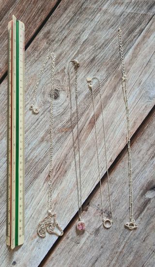 Lotto 4 collane con ciondoli