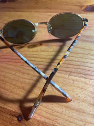 Gafas de sol Ray-Ban redondas doradas