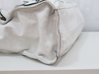 Bolso blanco de piel con trenzado