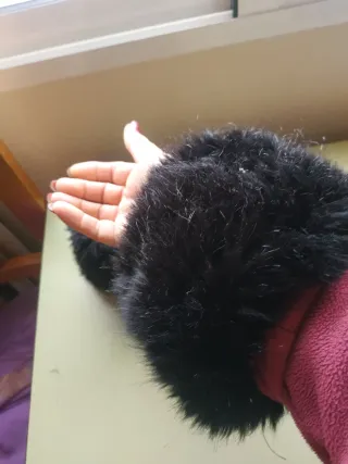 Puños pelo sintético negros