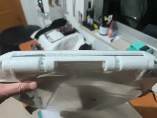 Tapa de inodoro nueva sin abrir .la bajo a costó.