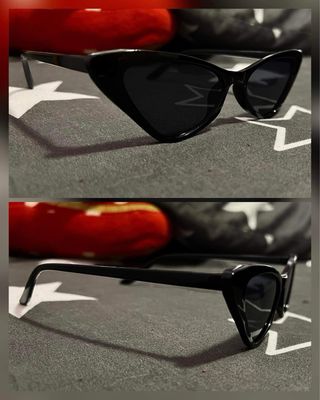 Gafas de sol negras con diseño ojo de gato.