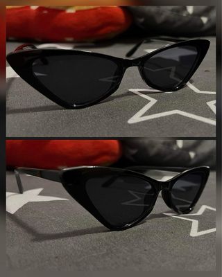 Gafas de sol negras con diseño ojo de gato.