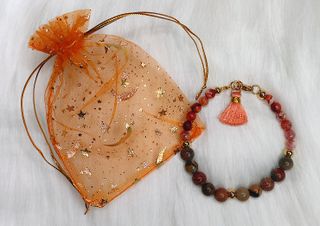 Pulsera de ágata natural tonos tierra con borla