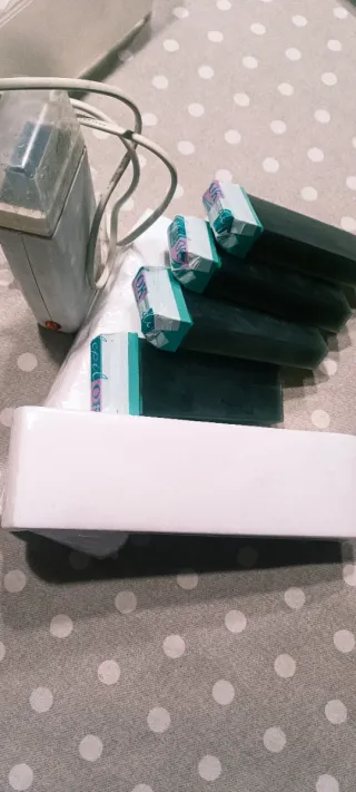 Depiladora cera roll-on + 4 recambios y bandas.