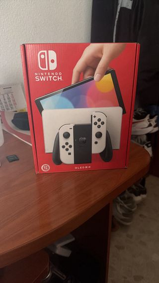 Nintendo Switch OLED + 500 Giochi + V2