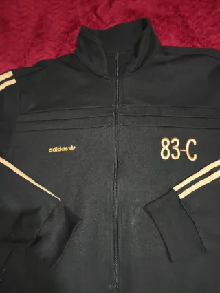 Chaqueta Adidas 83-C J. Mano Negra Dorada