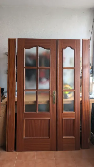 Puerta doble salón cristal y marco En Sayago