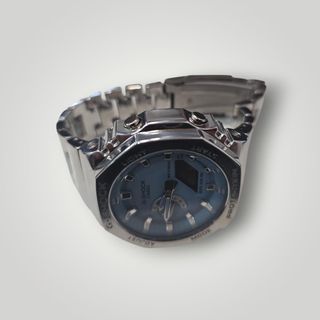 RELOJ CASIO G-SHOCK GM-2110D-2A PLATEADO/ESFERA AZUL + CAJA