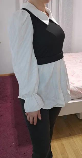 Blusa blanca con chaleco negro