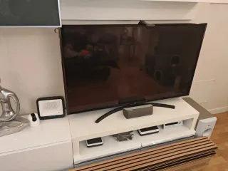 Mueble de salón modular gris y blanco