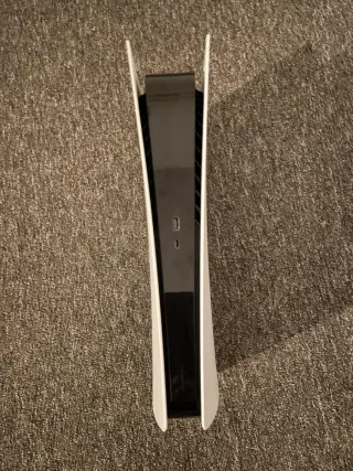 Consola PS5 con mando y maletín