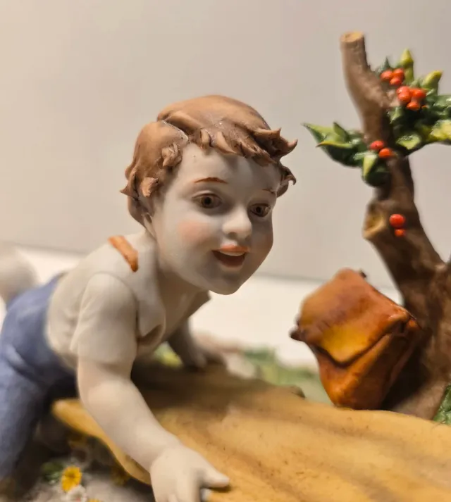 Figura porcelana alemana antigua niños balancín