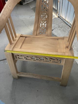 Sillón de madera tallada estilo oriental