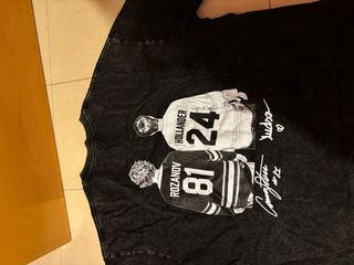 Camiseta Hockey Heated Rivalry Negra y Dorada