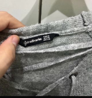 Jersey gris con cordones