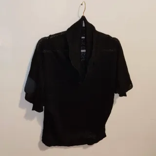 Jersey de punto negro cuello alto