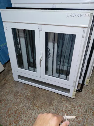 Ventana aluminio con su reja115x120