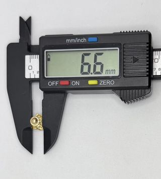 Pendiente Osos de oro de 18k, 0.47 g.