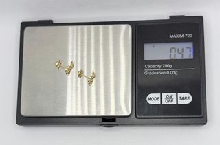 Pendiente Osos de oro de 18k, 0.47 g.