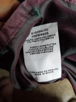 Blusa elegante morada y gris