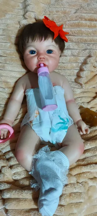 Reborn silicona niña con pelo injertado