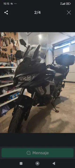 Kawasaki versus 1000 Se Moto Trail Negra con Malet