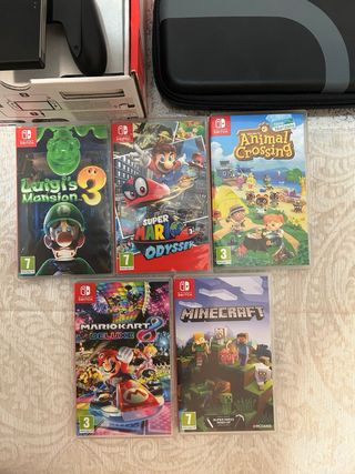 Nintendo Switch OLED + 5 Giochi
