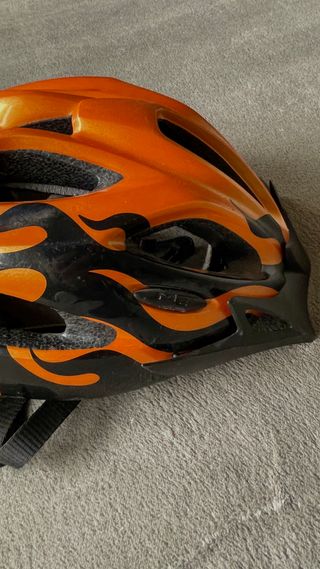 Casco de bicicleta MET naranja ajustable
