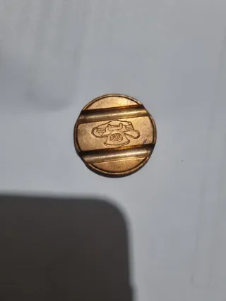 Gettone telefonico 7705