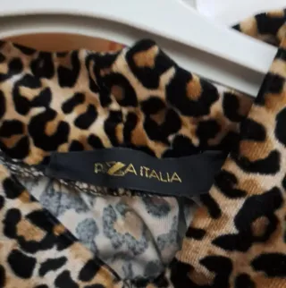 Blusa Leopardo Cuello Alto sin Mangas