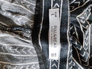 Pantalón fluido estampado blanco y negro