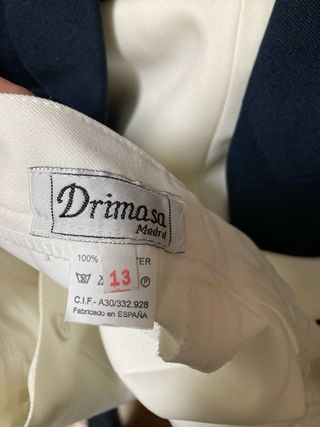 Traje de comunión azul con detalles dorados