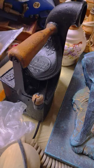 Plancha de carbón antigua 1898