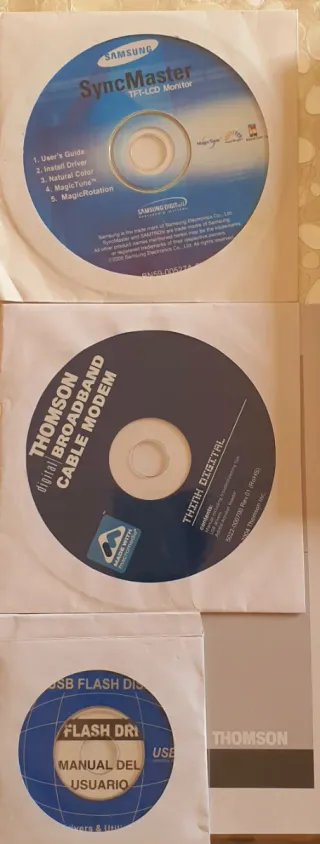 CDs y Manuales: Samsung, Thomson, HP