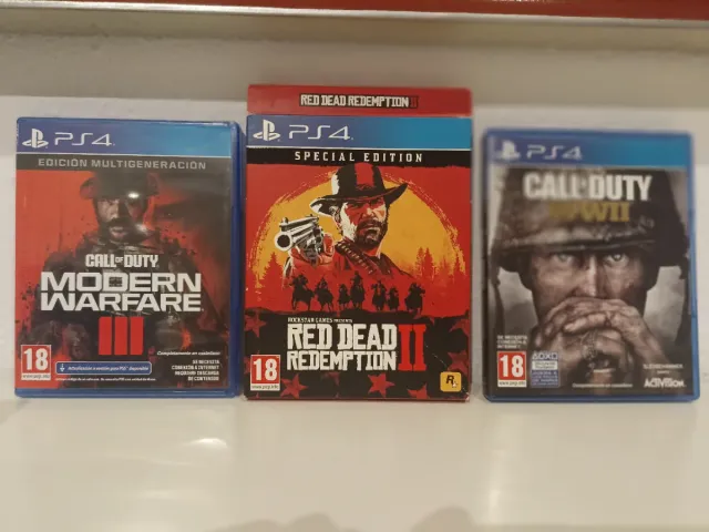 Playstation 4 500 GB Negra + 2 mandos + 9 juegos