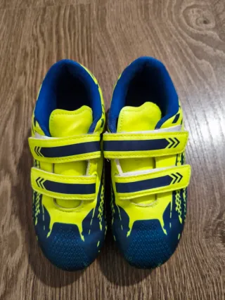 Botas de fútbol niño azul y amarillo número 32