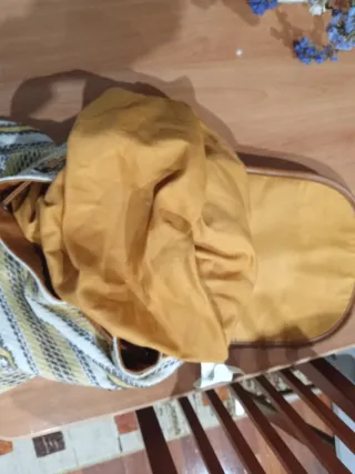 Mochila de tela con detalles en piel