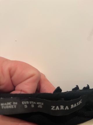 Camisa negra manga larga con detalles