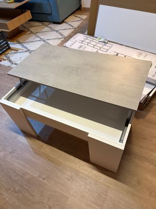 Mesa elevable comedor gris y blanco