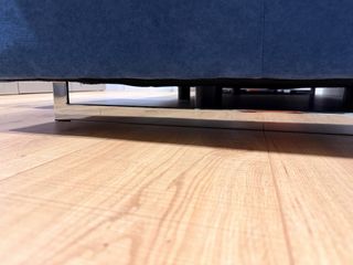 Sofá azul de tela extensible