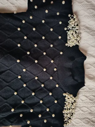 Jersey negro con perlas