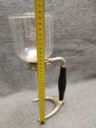 Antigua cafetera de bola Cona