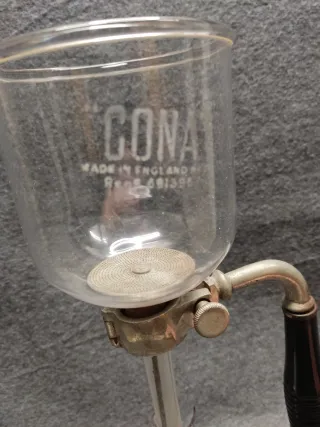 Antigua cafetera de bola Cona