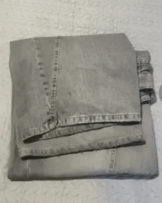 Pantalón vaquero gris wide leg con bolsillos