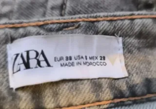 Pantalón vaquero gris wide leg con bolsillos